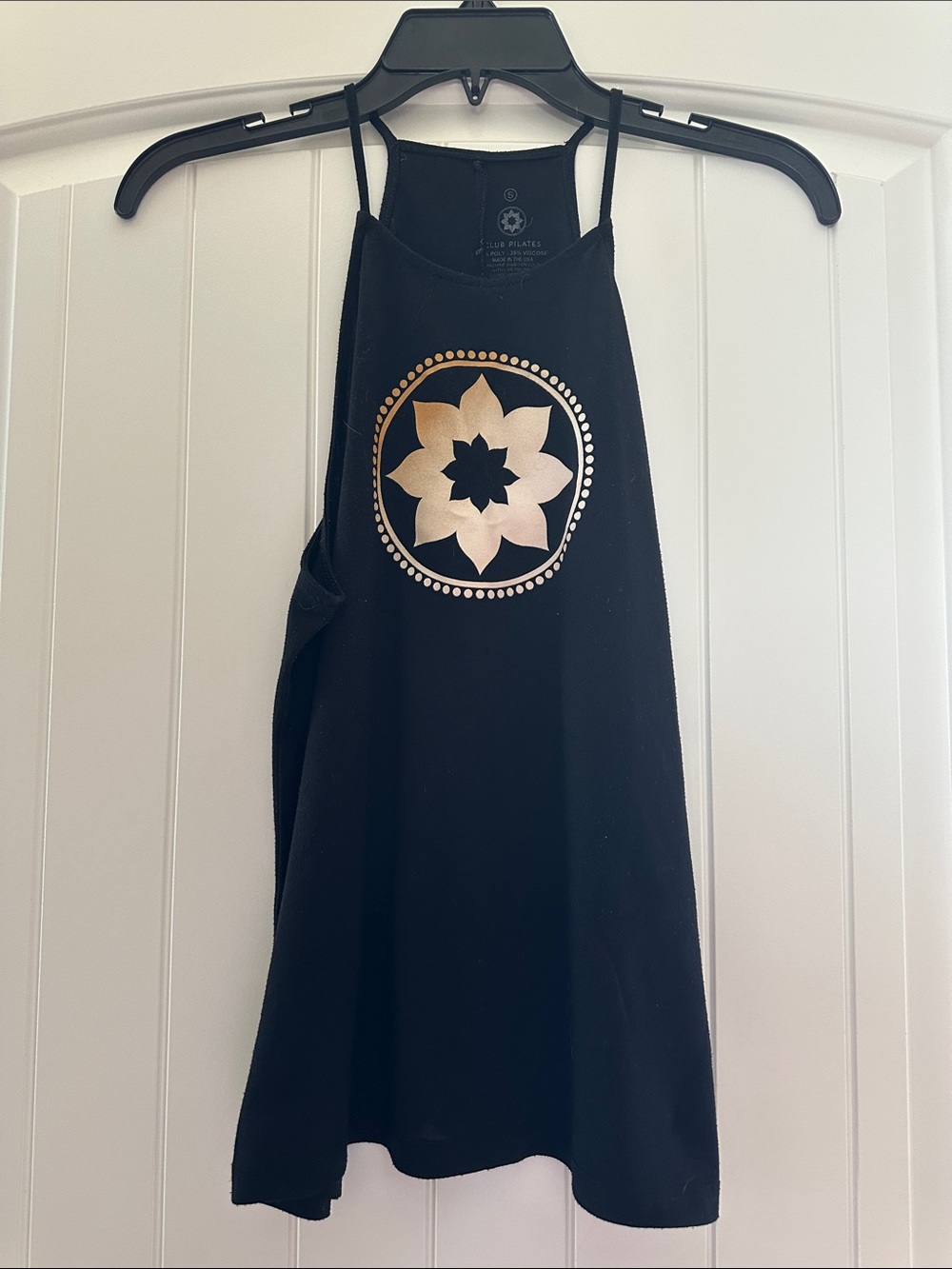 Club Pilates Black Tank Top with Gold Floral Medallion